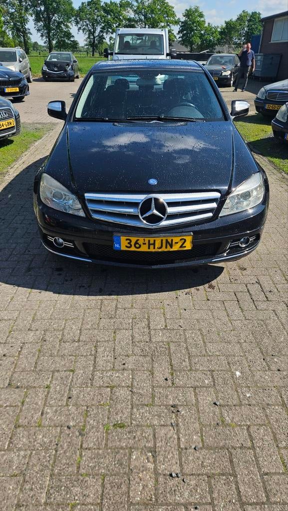 Mercedes-Benz C-Klasse 2.2 CDI C220 Sedan AUT 2007 Zwart, Auto's, Mercedes-Benz, Automaat, 1800 kg, Zwart, 4 cilinders
