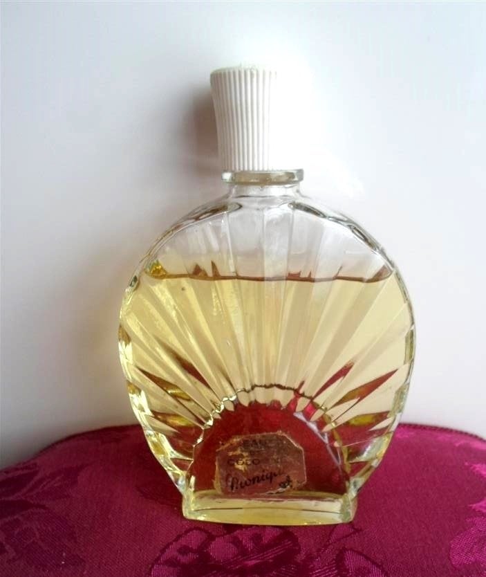 Oud flesje eau de cologne Monique. Jaren '70., Verzamelen, Parfumverzamelingen, Ophalen of Verzenden, Gebruikt, Parfumfles, Gevuld