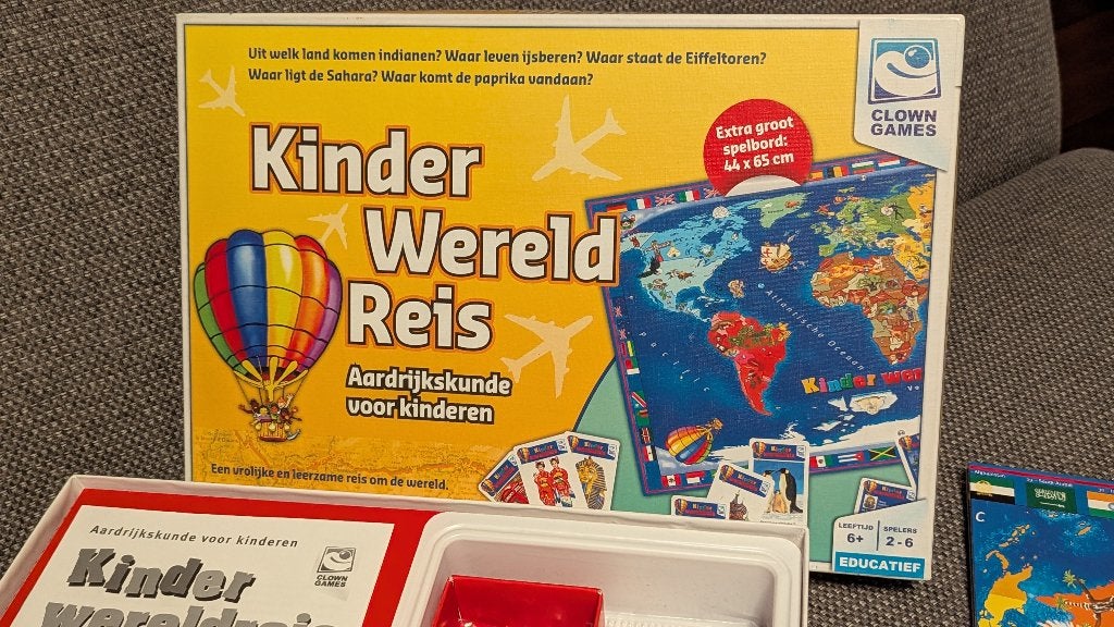 Kinder Wereldreis - Aardrijkskunde voor kinderen bordspel, Ophalen of Verzenden, Zo goed als nieuw, Clown Games
