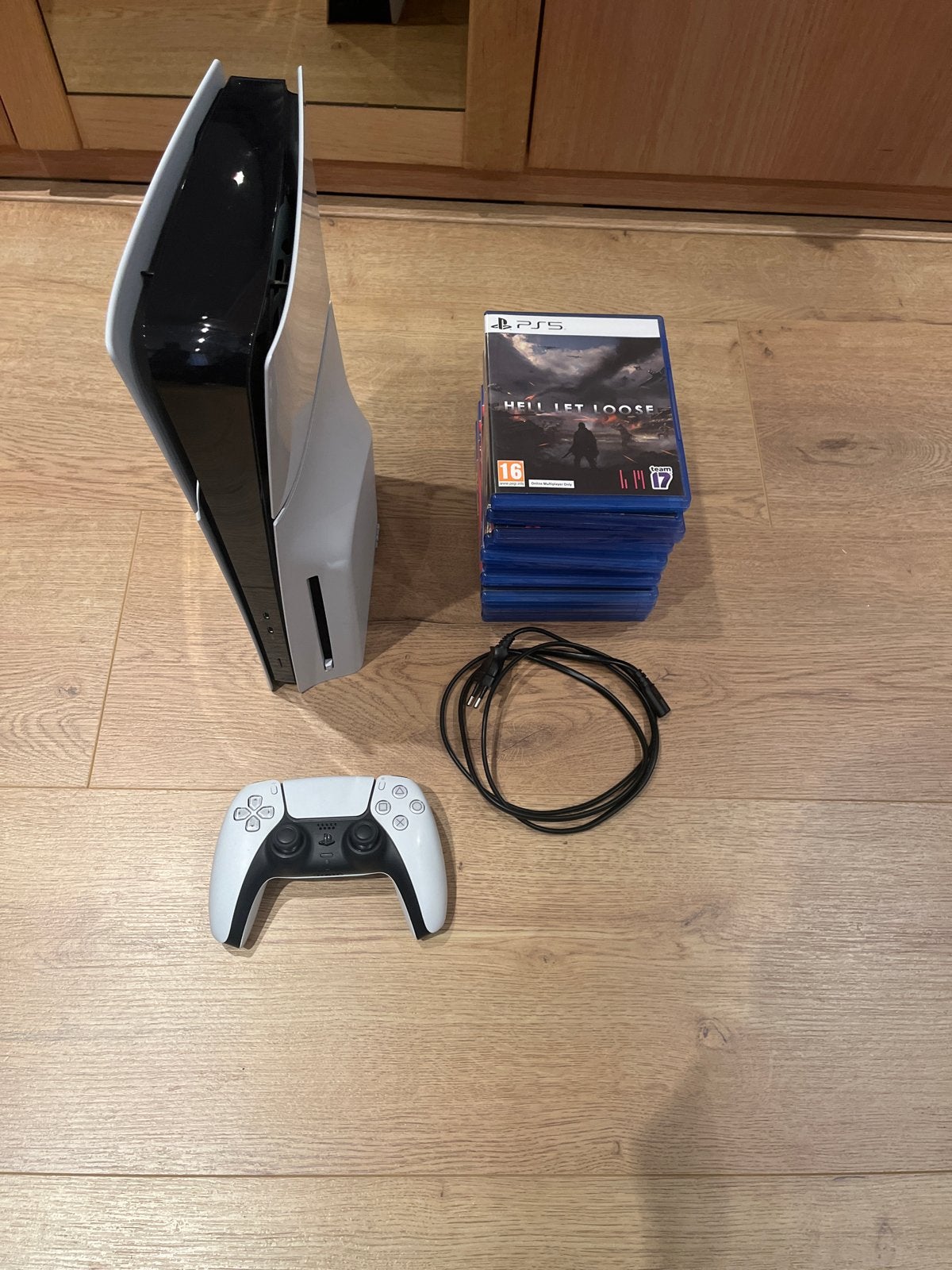 Sony PlayStation 5 Disc Edition met 11 games en controller, Spelcomputers en Games, Games | Sony PlayStation 5, Vanaf 18 jaar