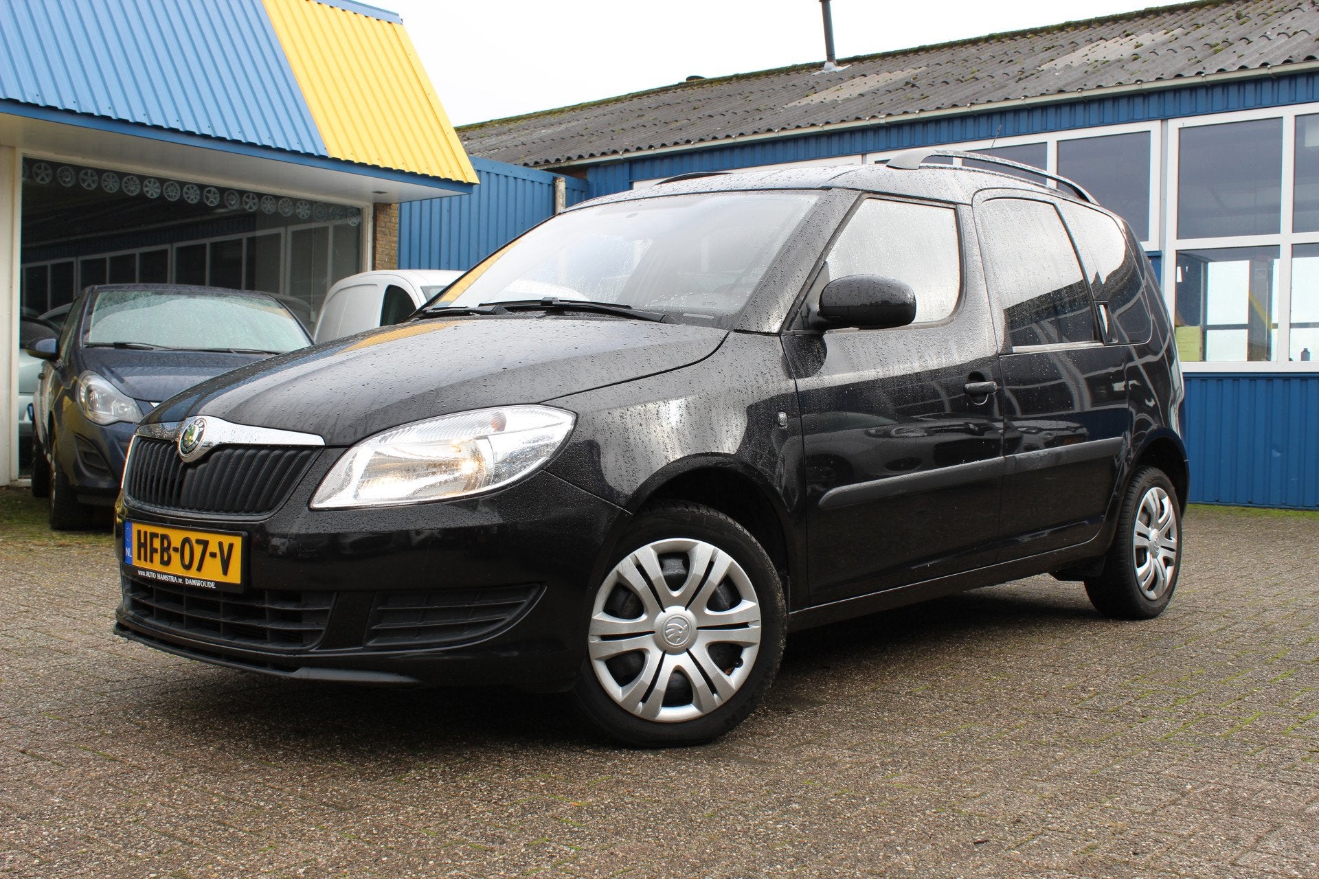 Skoda Roomster 1.2i "Plus Edition" Airco + AUX ! (bj 2011), Voorwielaandrijving, Gebruikt, Zwart, Zwart