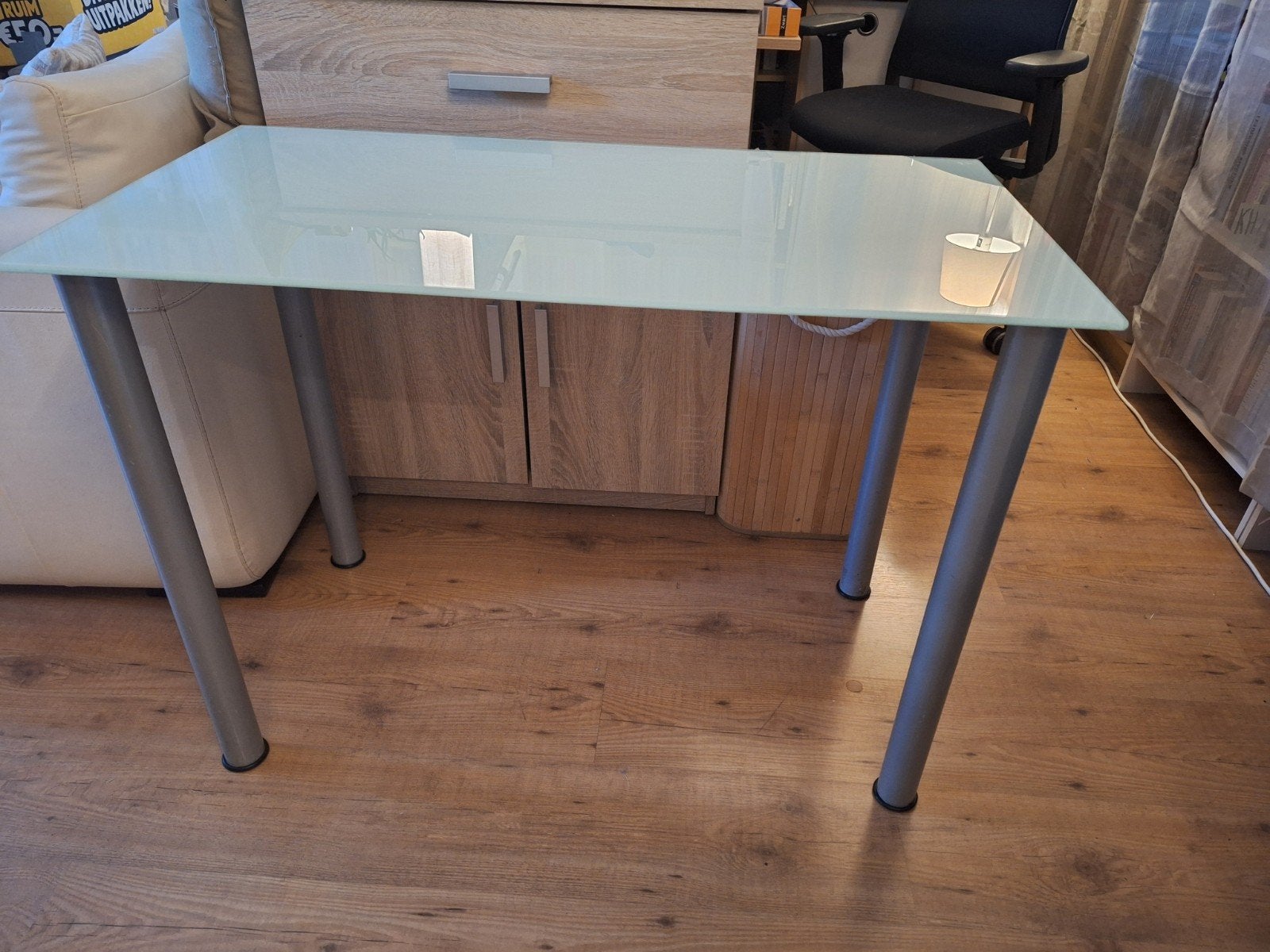 IKEA Glazen Tafel/Bureau 99x52x71,5 cm met Adils Poten, Ophalen, Gebruikt