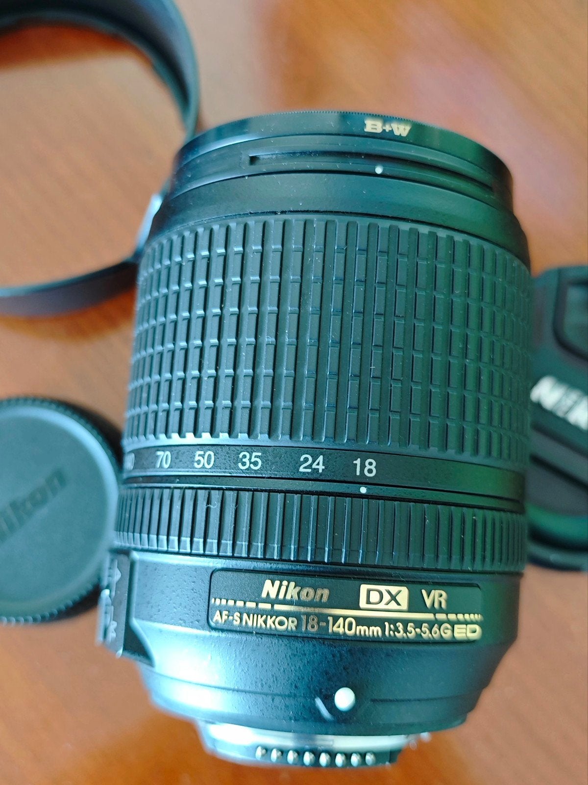 Nikon AF-S DX NIKKOR 18-140mm f/3.5-5.6G ED VR + B+W Filter, Audio, Tv en Foto, Fotocamera's Digitaal, Ophalen of Verzenden, Zo goed als nieuw