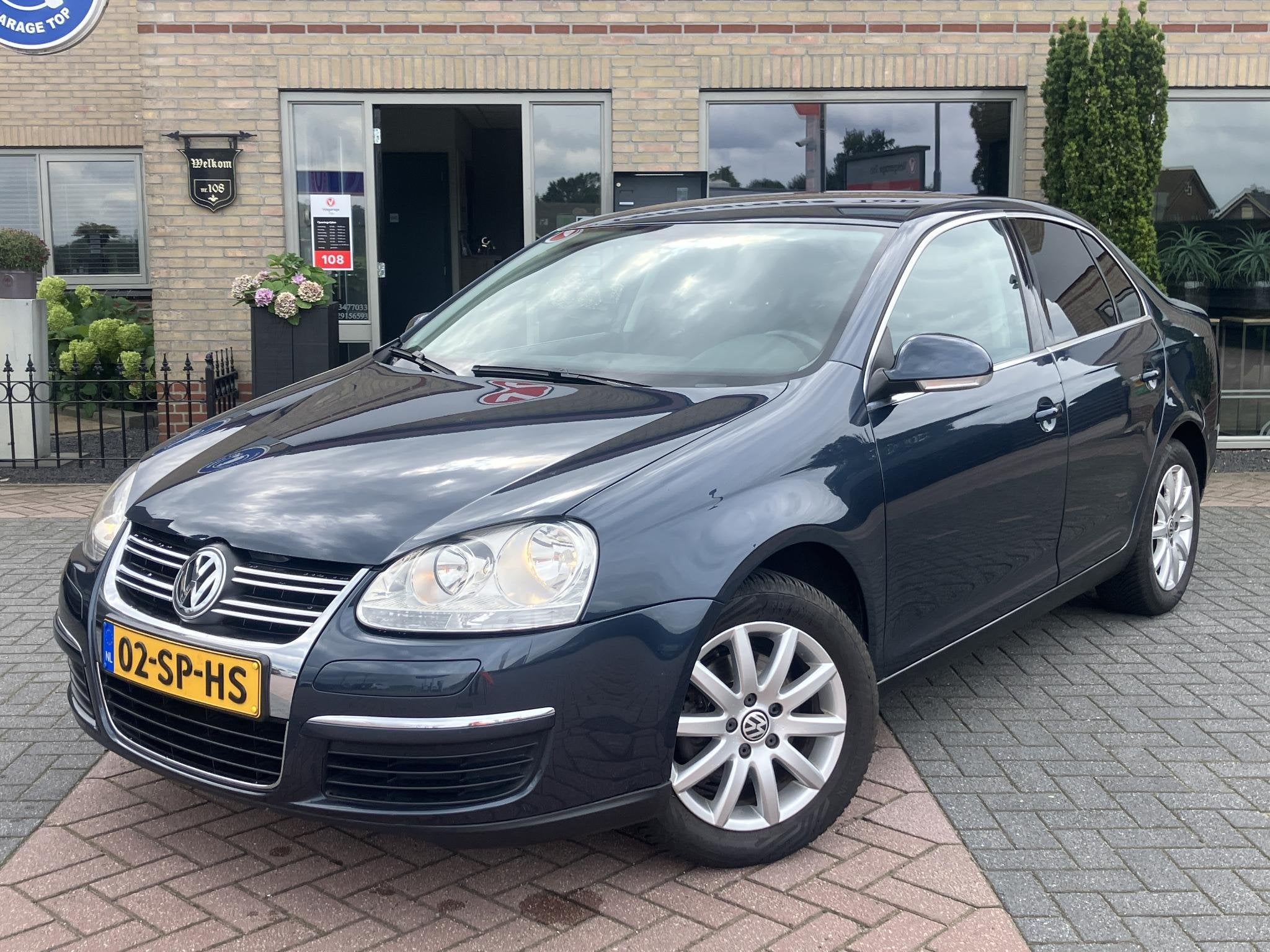 Volkswagen Jetta 2.0 FSI Comfortline | Trekhaak | PDC | Navi, Auto's, Gebruikt, Zwart, 4 cilinders, Origineel Nederlands