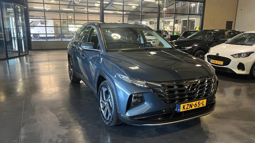 Hyundai TUCSON 1.6 T-GDI Automaat Premium 1650 kg Trekhaak, Auto's, Automaat, Gebruikt, Huisgarantie, 4 cilinders