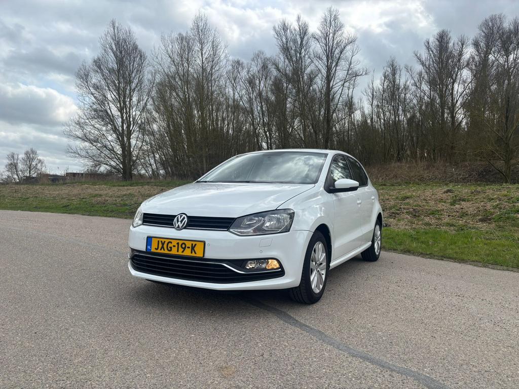 Volkswagen Polo 1.2 TSI., Voorwielaandrijving, Stof, Zwart, Wit