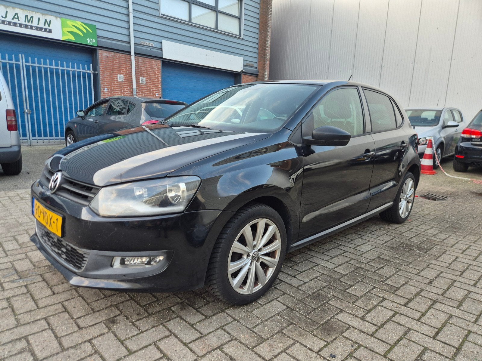 Volkswagen Polo 1.4 16V FSI 63KW 2009 Zwart, Auto's, Volkswagen, Voorwielaandrijving, 970 kg, 40 €/maand, 4 cilinders