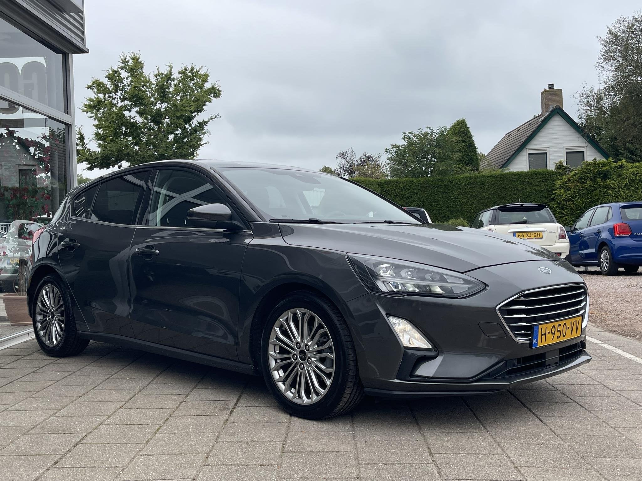 Ford Focus 1.0 EcoBoost Titanium Business /Cruise/Clima/Trek, Gebruikt, Euro 6, Met garantie (alle), Origineel Nederlands