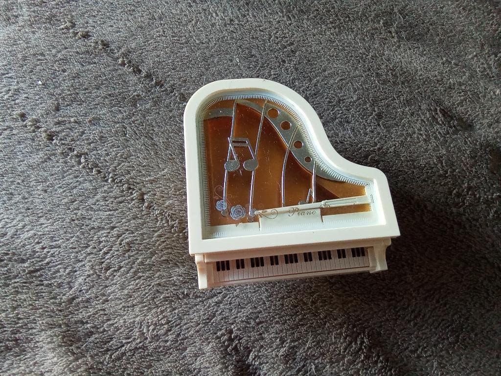 1 miniatuur piano muziekdoosje, Ophalen