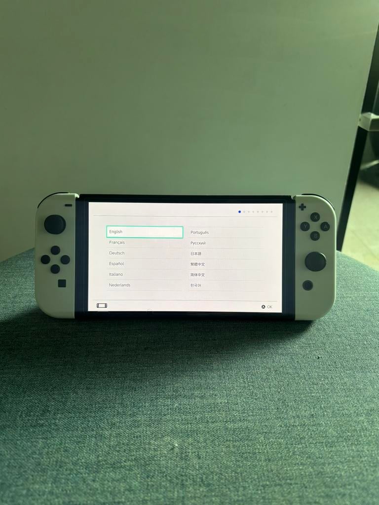 Nintendo Switch Oled wit met 2 spellen., Switch OLED, Met games, Met 2 controllers, Ophalen of Verzenden