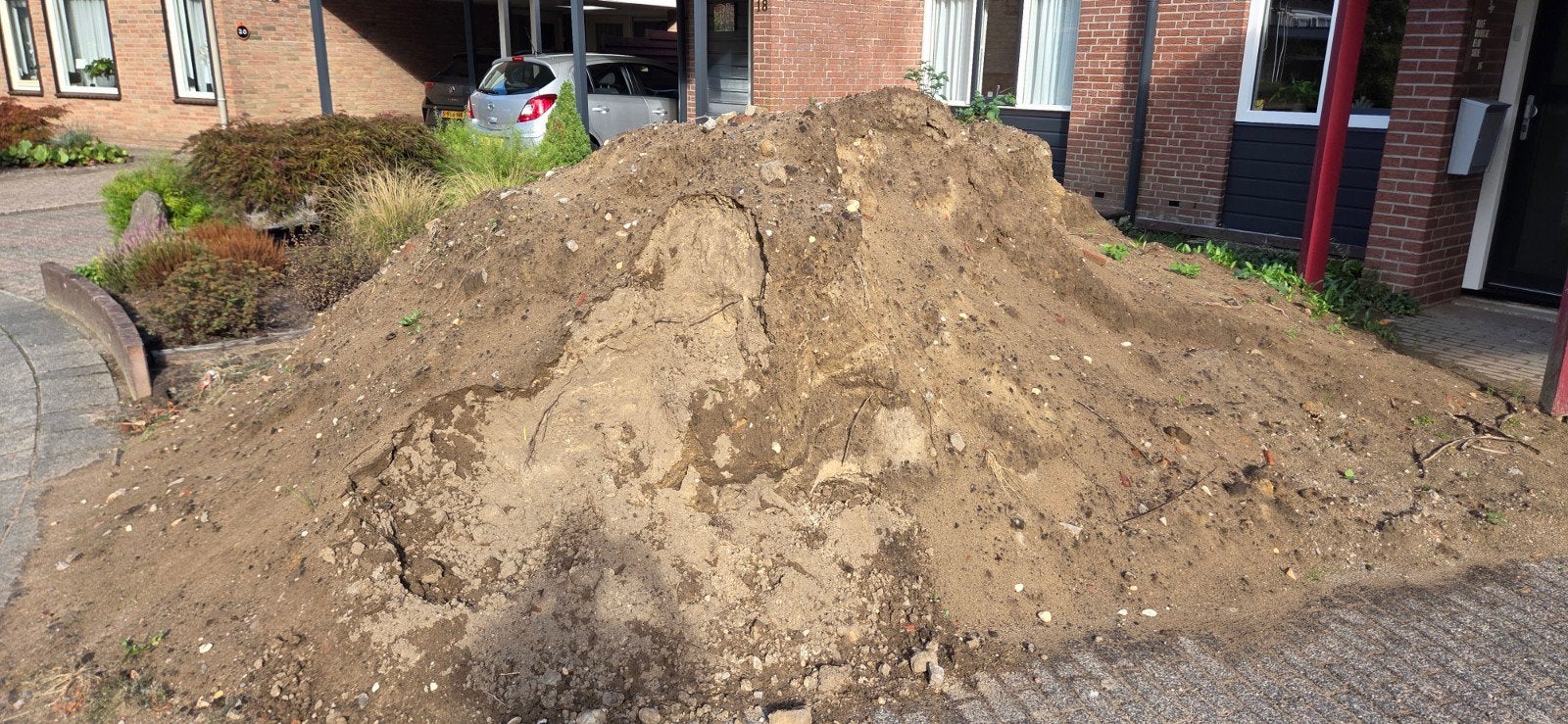 Afgegraven zwart zand, Tuin en Terras, Ophalen