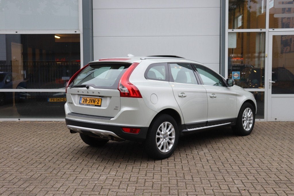 Volvo XC60 3.2 AWD SUMMUM/ORIG.NL/PAN.DAK/NAVI/STOEL.VERW/CA, Auto's, Automaat, 238 pk, Open dak, Wit