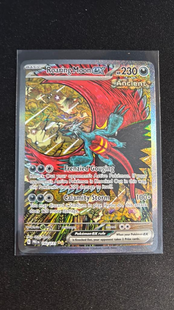 Roaring Moon 162/131 | NM | Prismatic Evolutions, Ophalen of Verzenden, Zo goed als nieuw, Losse kaart