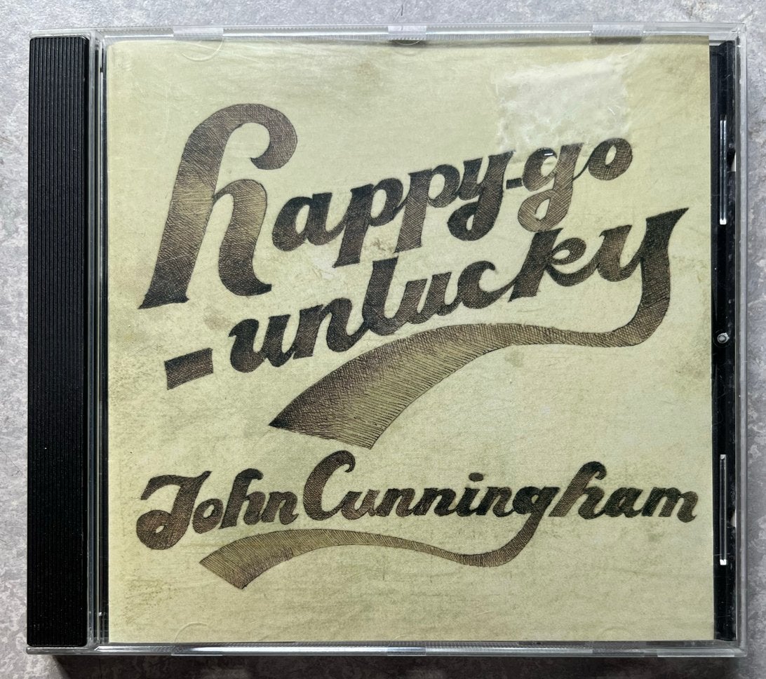 John Cunningham - Happy-go-unlucky (cd Indie rock), Ophalen of Verzenden, Gebruikt, Poprock