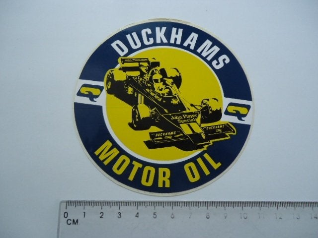 sticker oud DUCKHAMS Lotus motor Formule 1 John Player f1 f-, Verzamelen, Stickers, Verzenden, Zo goed als nieuw, Bedrijf of Vereniging