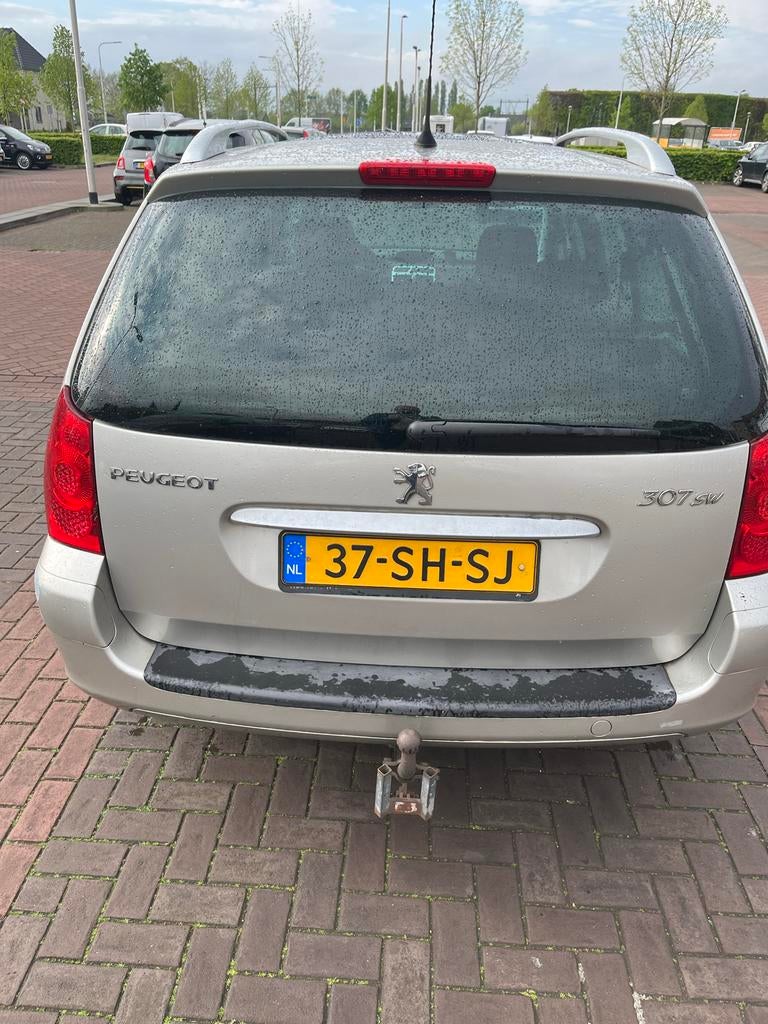 Peugeot 307 1.6 16V XR Break 2006 Grijs, Auto's, 4 cilinders, 715 kg, 7 stoelen, Origineel Nederlands