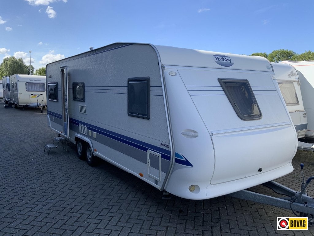 Hobby Prestige 650 KMFE, Caravans en Kamperen, Hobby, Bedrijf, Treinzit, Overige typen