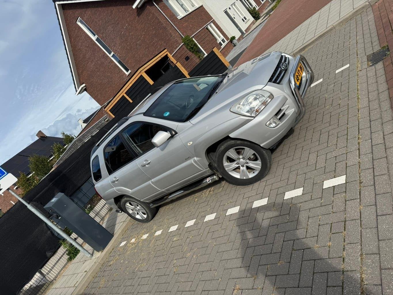 Kia Sportage 2.7 v6  4WD AUT 2007 Grijs airco, Auto's, Automaat, Zwart, 2656 cc, Bedrijf