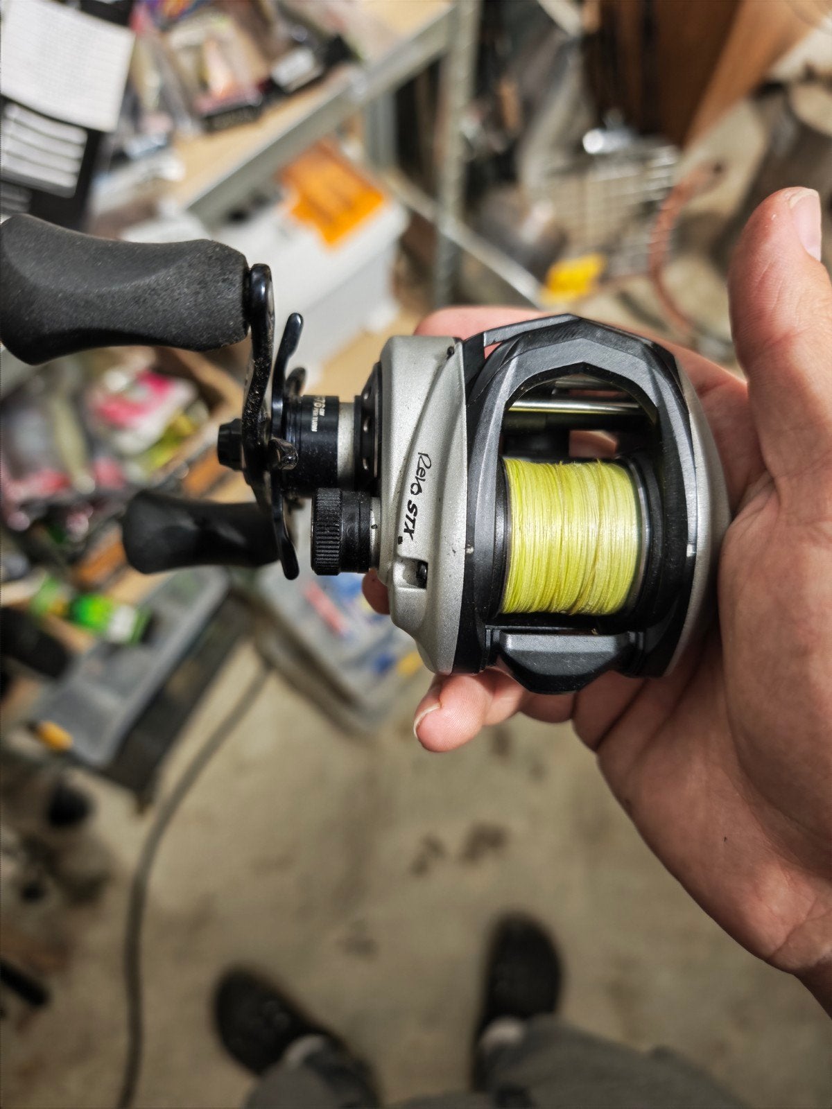 Abu Garcia Revo STX Baitcaster Molen, Ophalen of Verzenden, Gebruikt, Molen