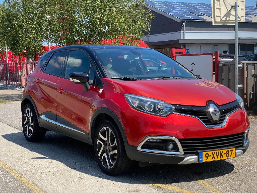 Renault Captur 0.9 TCE 90 2014 Rood 170703 Km Nap Airco, Auto's, Voorwielaandrijving, 898 cc, Leder en Stof, 49 €/maand