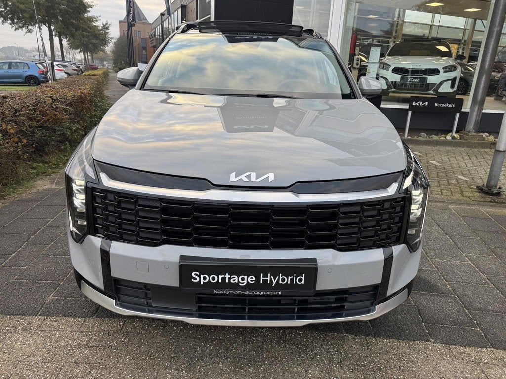 Kia Sportage 1.6 T-GDi Hybrid DynamicPlusLine , Snel Leverba, Auto's, Kia, Adaptive Cruise Control, Euro 6, 4 cilinders, Leder en Stof