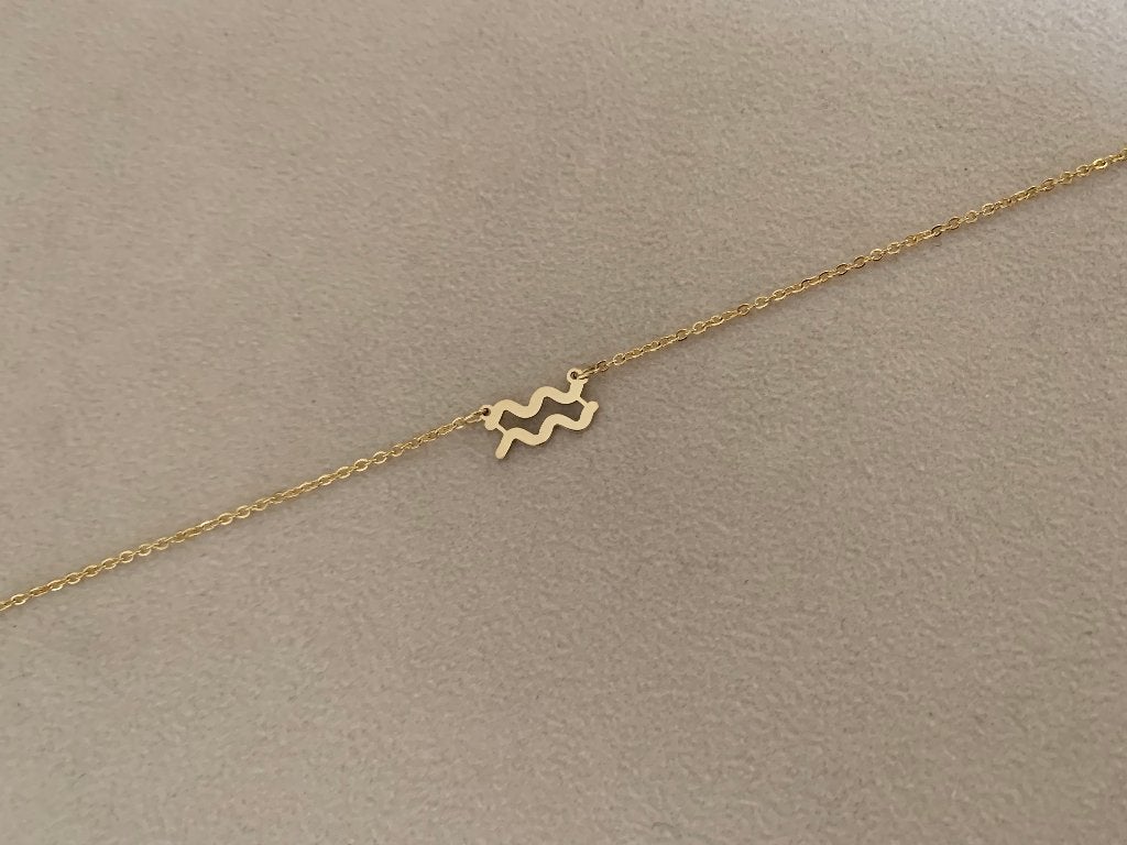 Gouden ketting met sterrenbeeld bedel waterman waterproof, Nieuw, Ophalen of Verzenden, Goud, Overige materialen