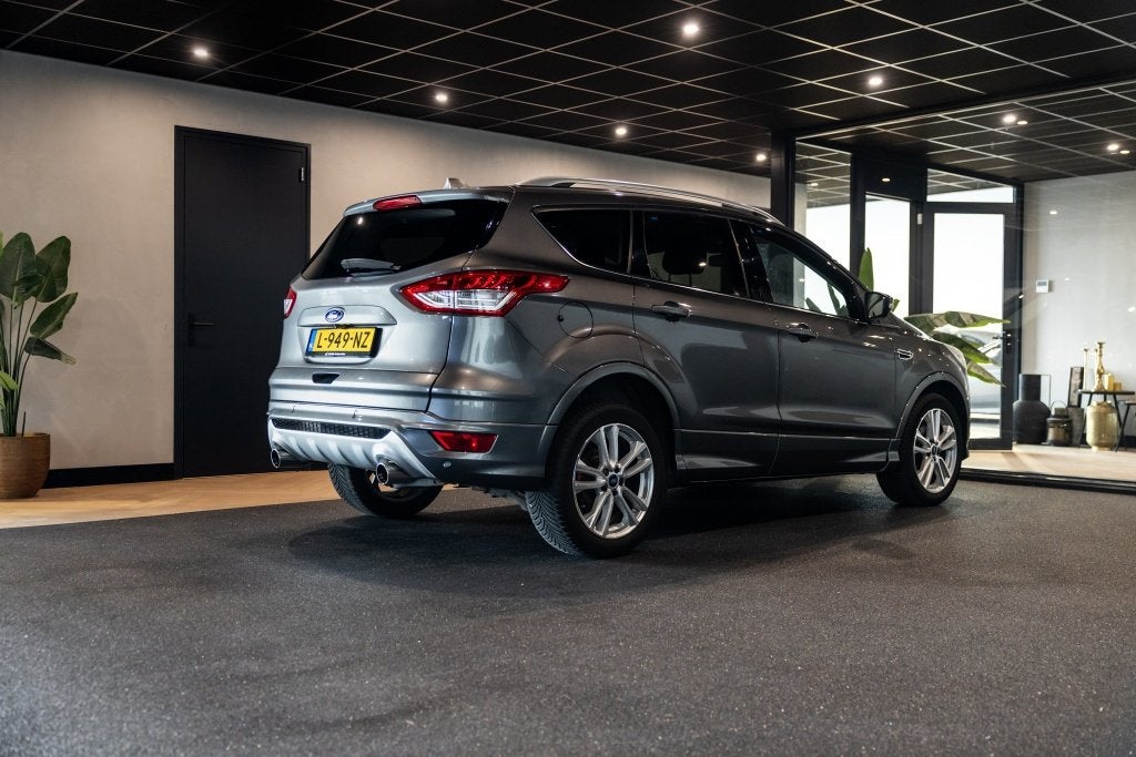 Ford Kuga 1.6 Titanium | Camera | Half Leer | Winter Pakket, Auto's, Ford, Keurmerk '100% Onderhouden', 15 km/l, Gebruikt, Zwart