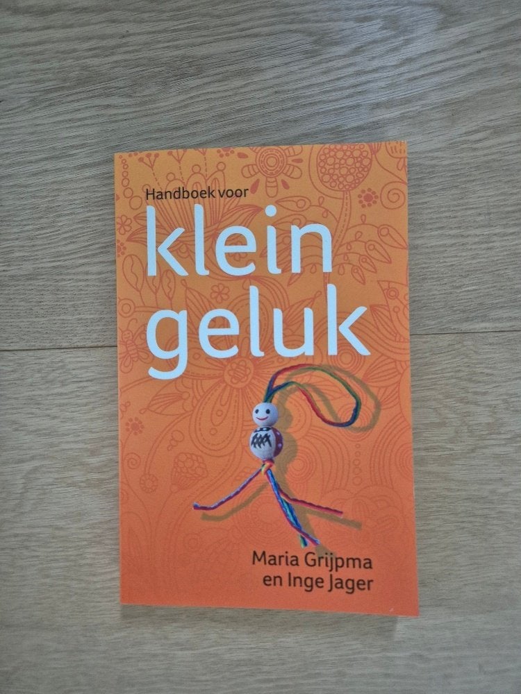 Handboek voor klein geluk, Ophalen of Verzenden, Zo goed als nieuw