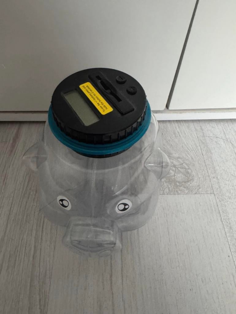 Spaarvarken dat munten telt, Ophalen of Verzenden, Zo goed als nieuw, Overige materialen, Dier
