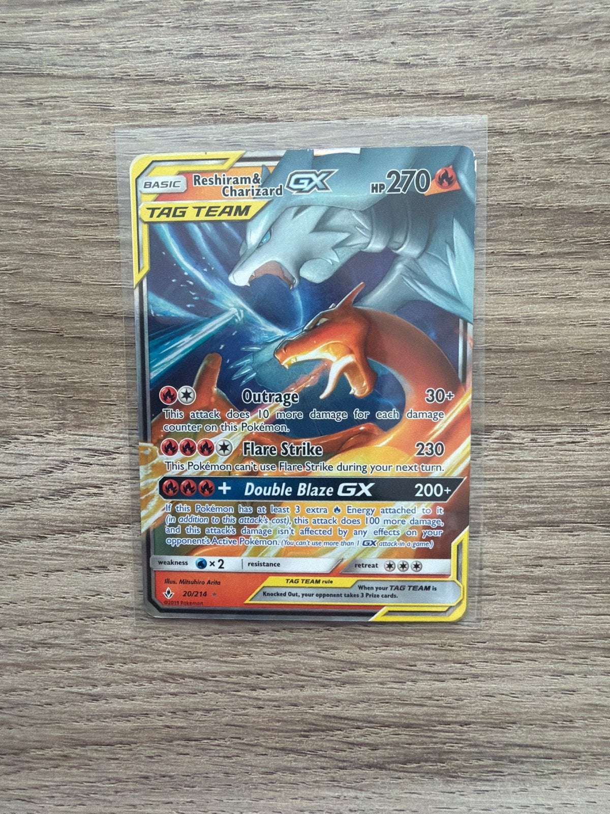 Reshiram & Charizard GX TAG TEAM Pokémon Kaart, Hobby en Vrije tijd, Verzamelkaartspellen | Pokémon, Ophalen of Verzenden, Zo goed als nieuw