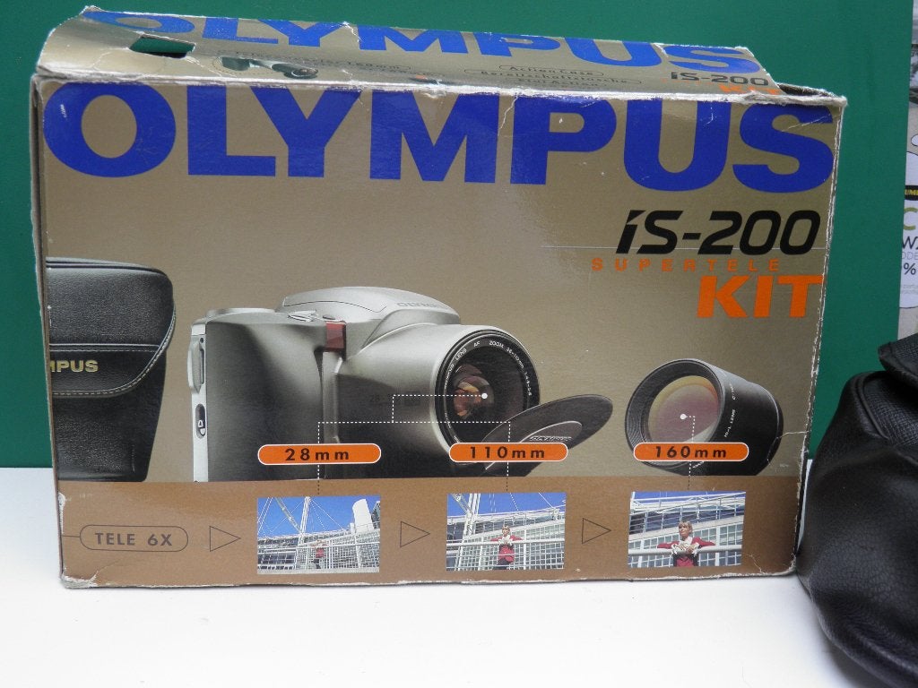 olympus is-200 plus converter, Ophalen of Verzenden, Zo goed als nieuw, Spiegelreflex, Canon