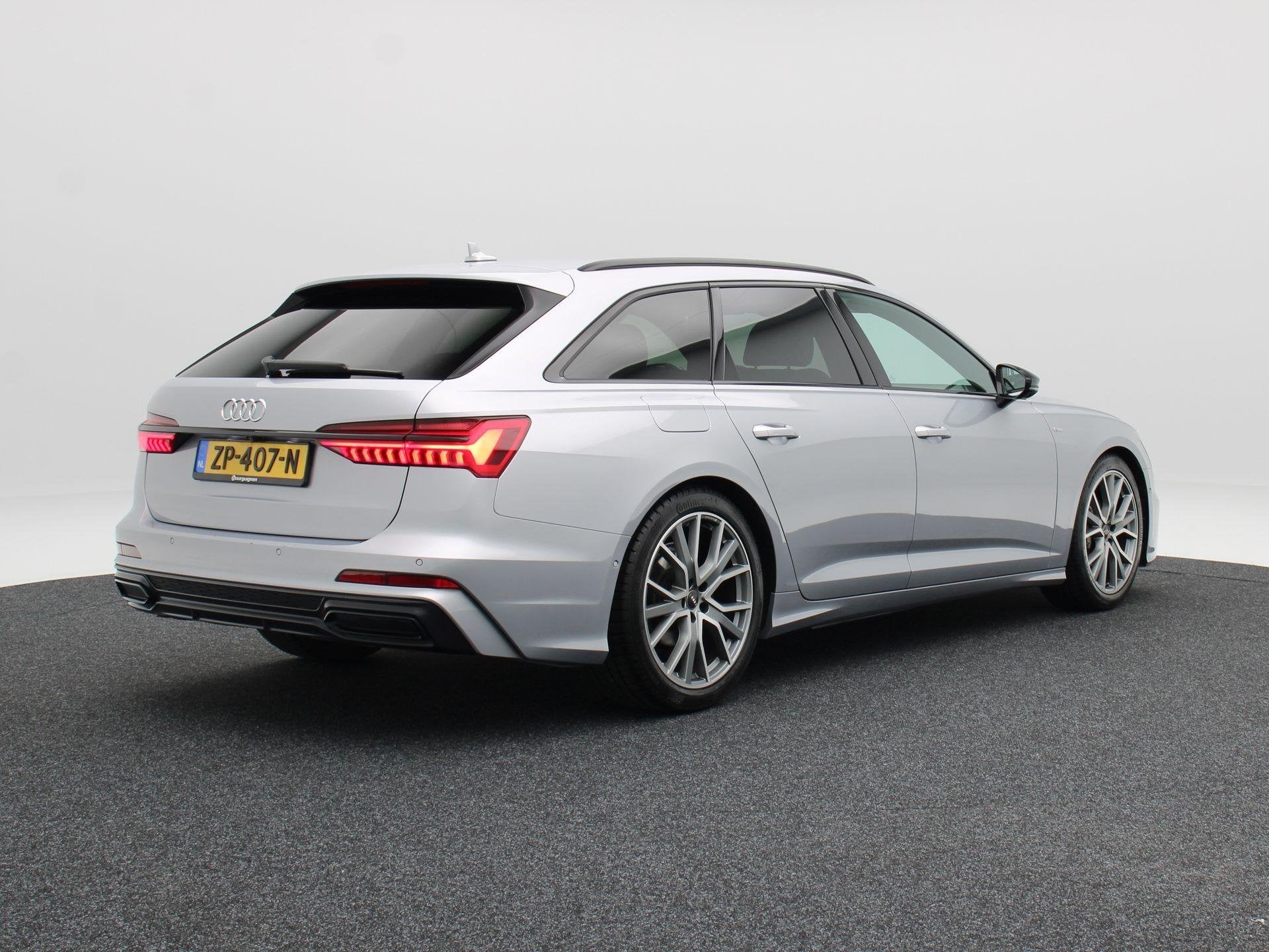 Audi A6 Avant 40 TDi 204 Pk Automaat Sport Launch edition Sp, Auto's, Dealer onderhouden, Gebruikt, 2000 kg, Leder en Stof