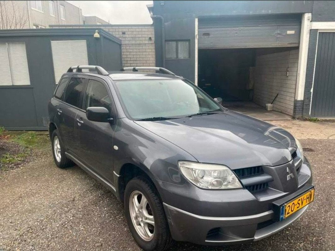 Mitsubishi Outlander 2.0 MPI 2WD 2006 Grijs apk tot 8-4-2027, Auto's, Mitsubishi, Particulier, Outlander, Benzine, E, SUV of Terreinwagen