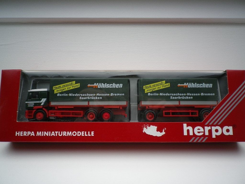 Herpa MAN F2000 Huifcombi Hoelschen. Nieuw, Ophalen of Verzenden, Nieuw, Bus of Vrachtwagen, Herpa