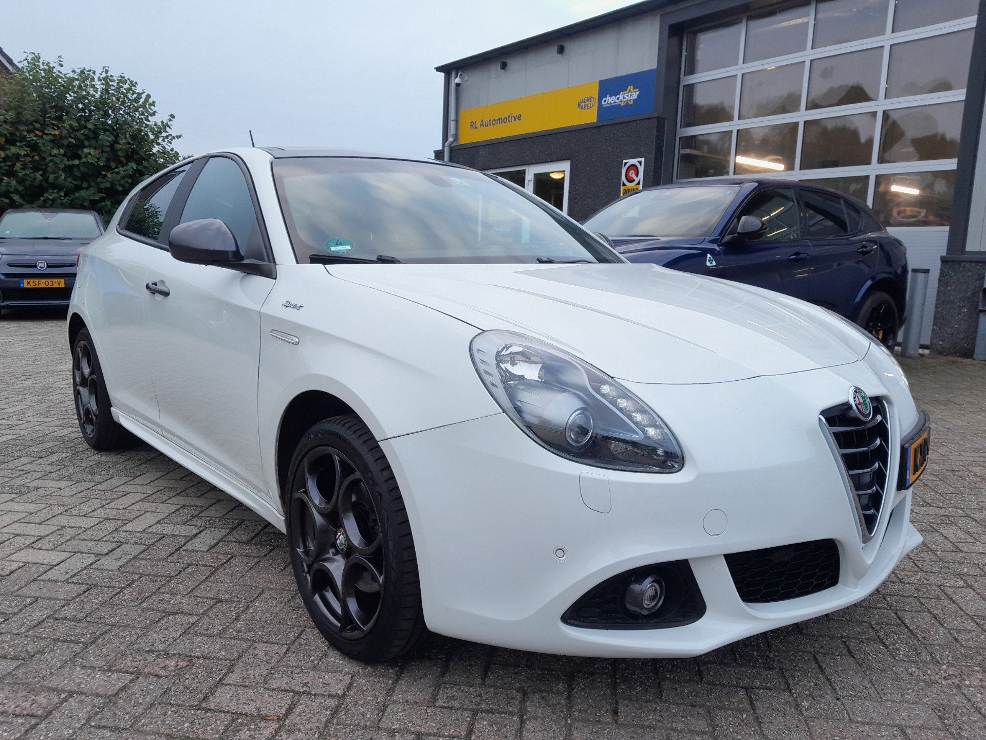 Alfa Romeo Giulietta 1.4 T Sprint - Schuif / kanteldak - Nav, Auto's, Voorwielaandrijving, Dealer onderhouden, Gebruikt, Euro 6