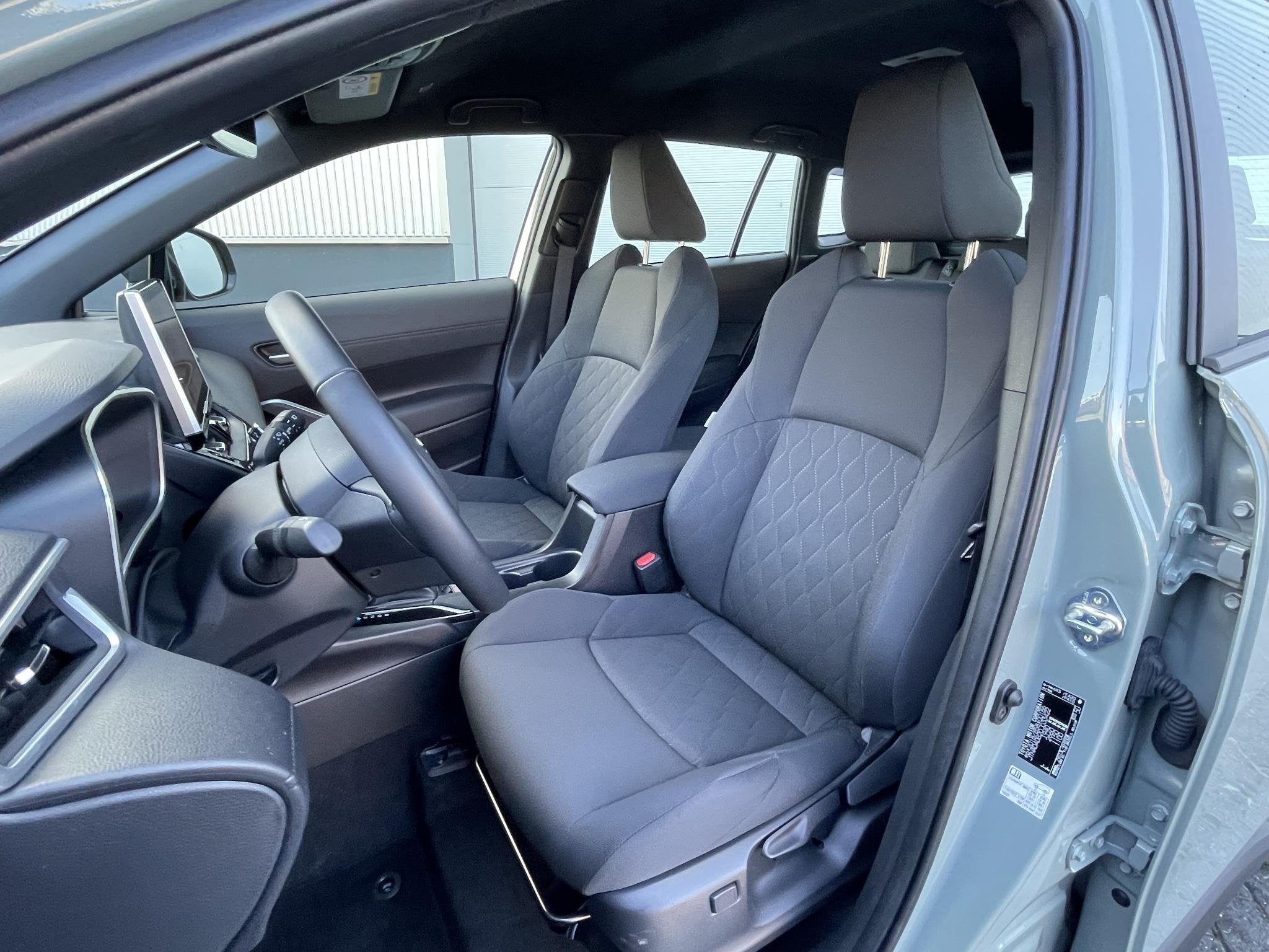 Toyota Corolla Cross Hybrid 140 Active Org Nl, Auto's, Dealer onderhouden, Stof, Gebruikt, Origineel Nederlands