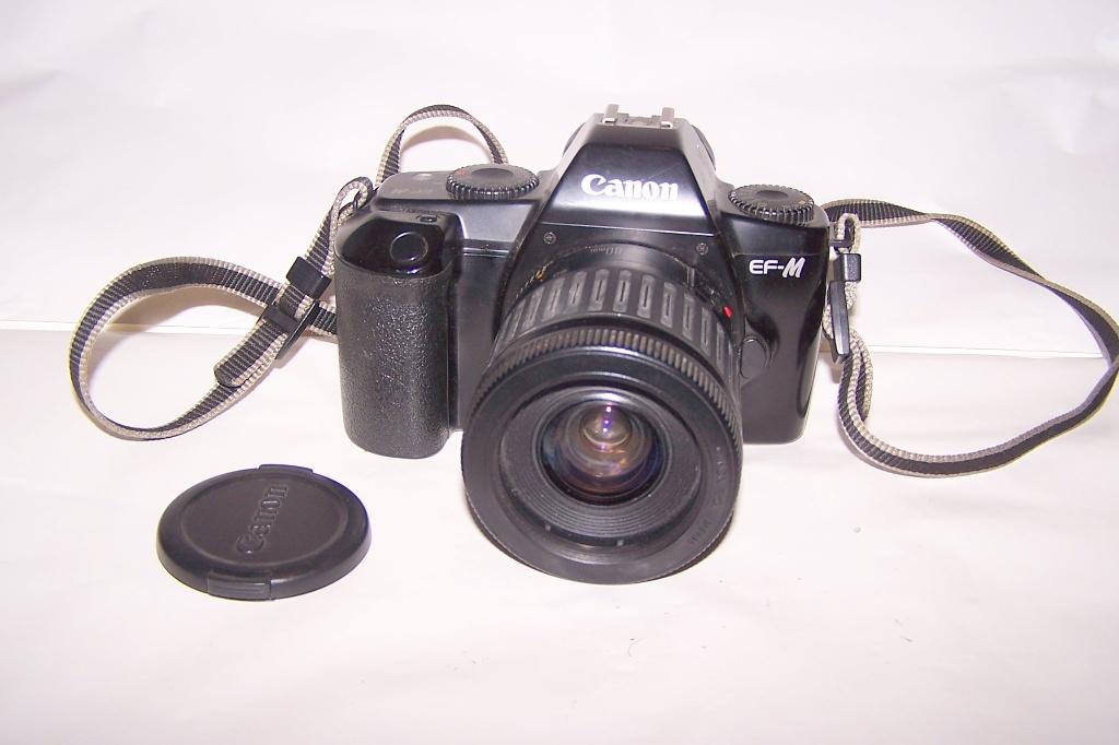 Canon EF-M Slr met 35-80mm lens. Izgs., Ophalen of Verzenden, Zo goed als nieuw, Spiegelreflex, Canon