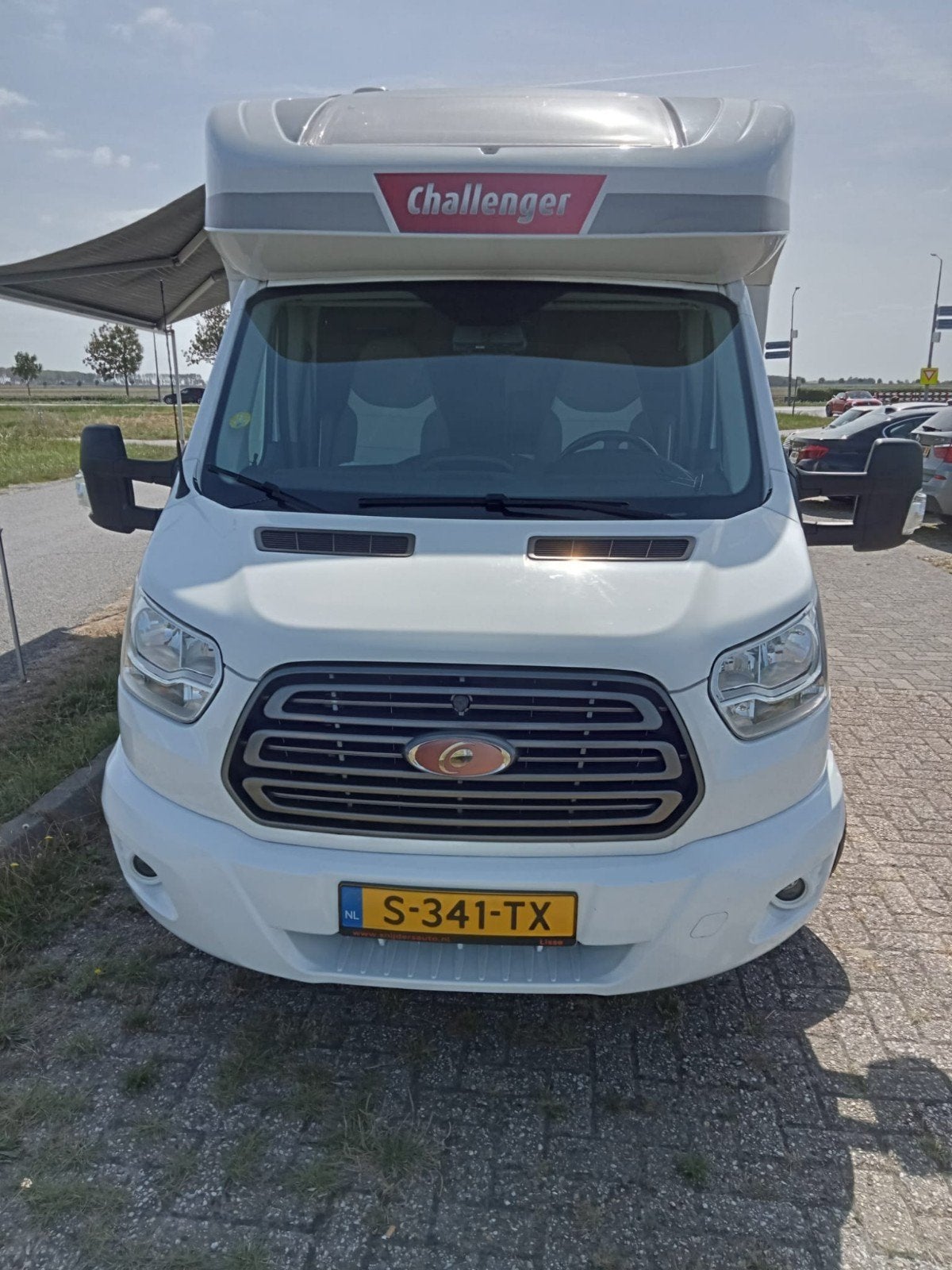 Te Koop en rijklaar een Ford challenger 288EB, Caravans en Kamperen, Standaard zit, Koelkast, Ford, 6 tot 7 meter