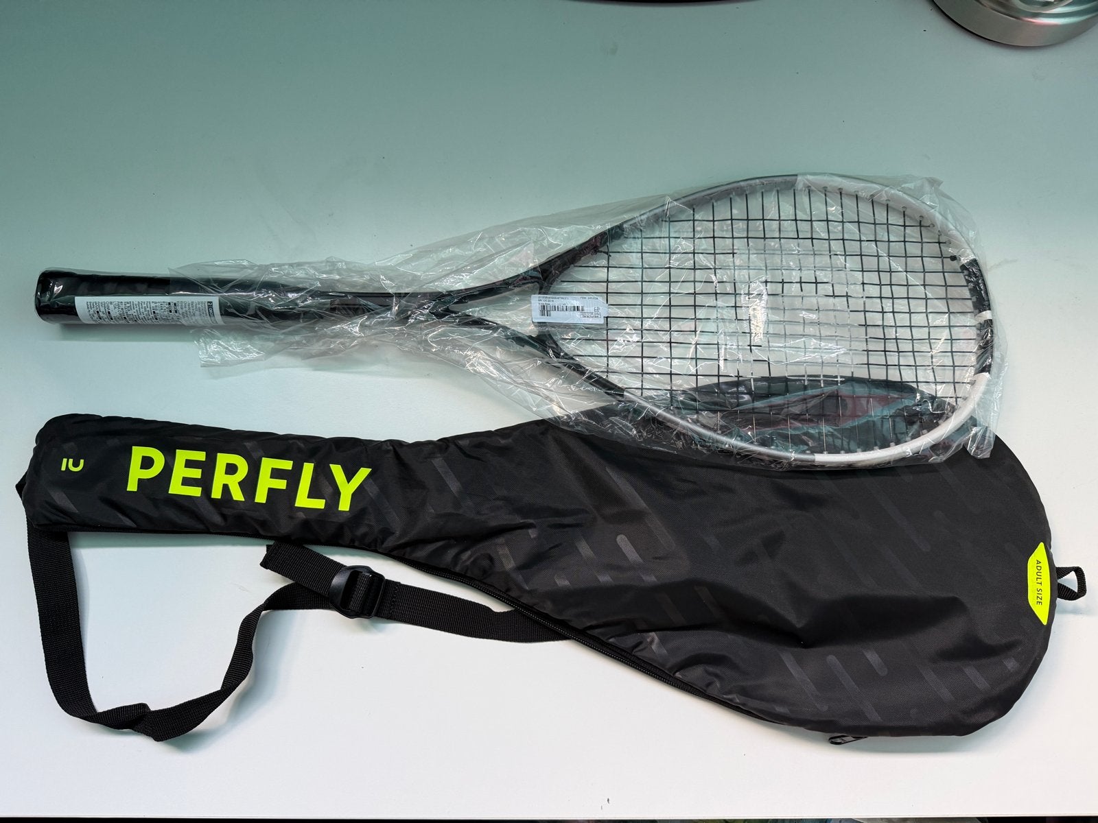 Decathlon OPFEEL SR130 squash racket (nieuw), Sport en Fitness, Squash, Ophalen, Nieuw, Racket, Met hoes
