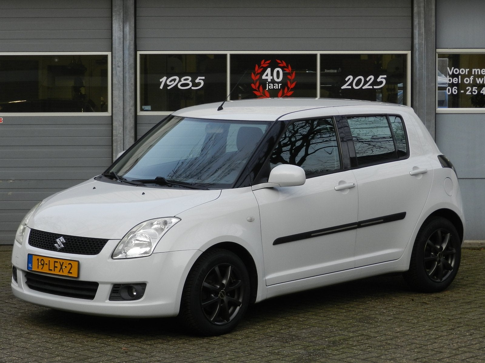 Suzuki Swift 1.3 5Deurs Cool Airco CV afst Isofix LMV Reserv, Auto's, Voorwielaandrijving, Dealer onderhouden, Stof, Zwart