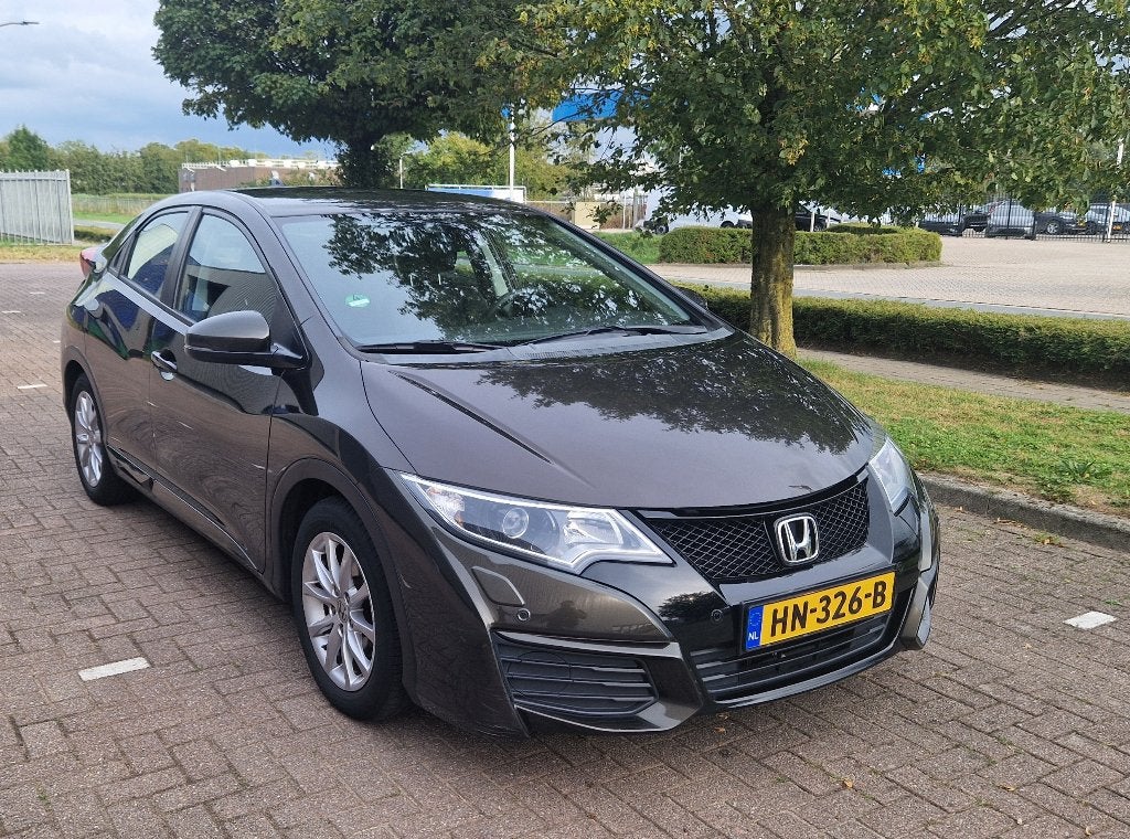 Honda Civic 1.4 i-VTEC Comfort Business Edition, BOVAG 100%, Auto's, Honda, Voorwielaandrijving, Dealer onderhouden, Stof, 4 cilinders
