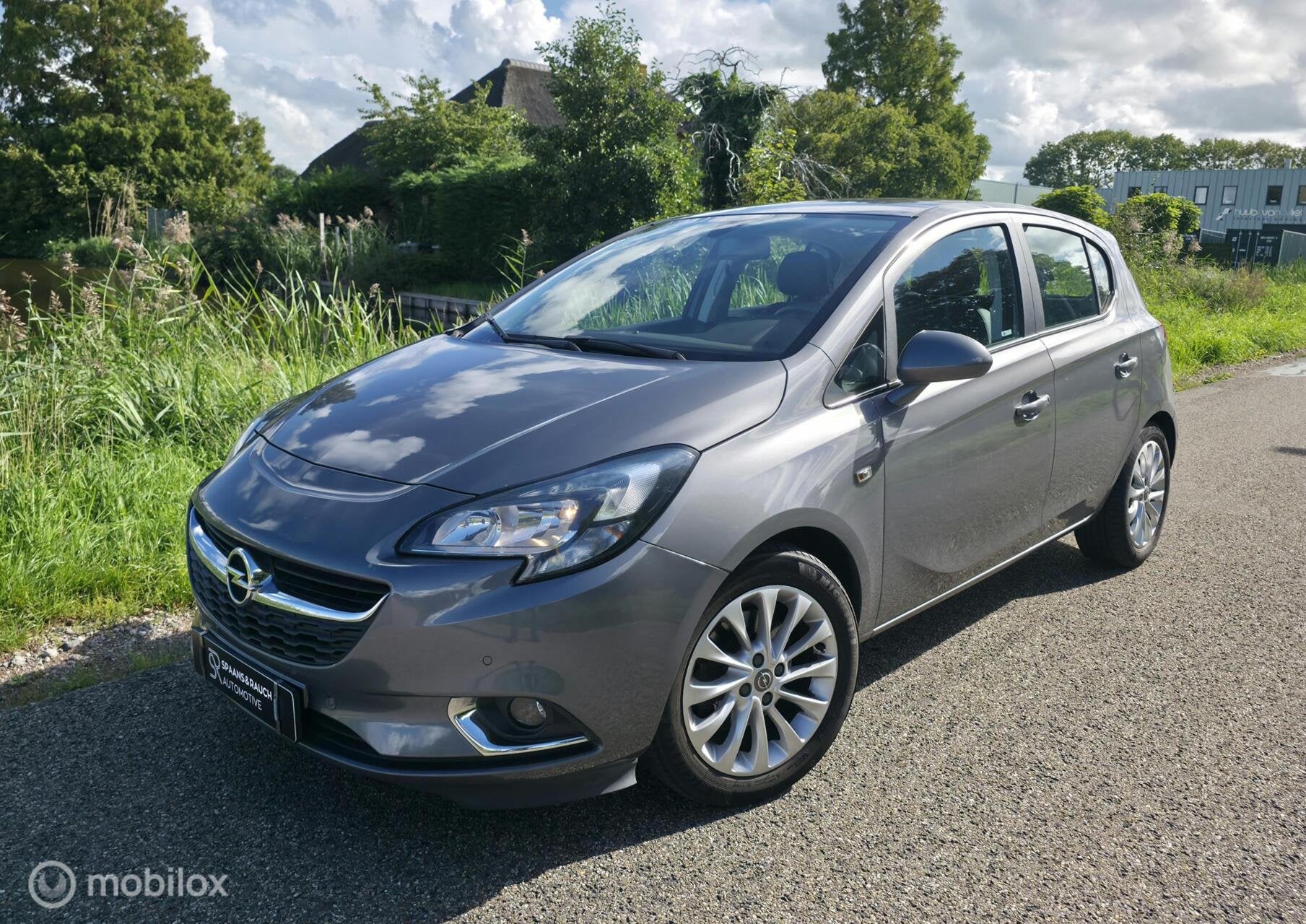 Opel Corsa 1.0 Turbo Business+ / Half leder / Cruise control, Auto's, Voorwielaandrijving, Gebruikt, Leder en Stof, 49 €/maand