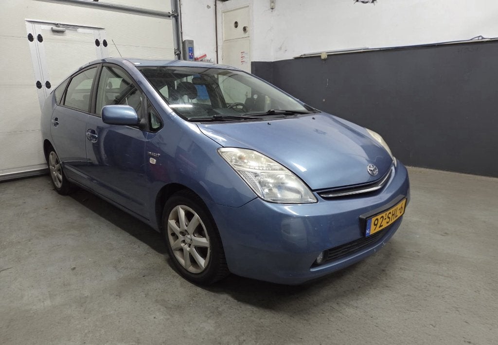 Toyota Prius 1.5 Hybrid | Automaat | Camera | Navi | Clima, 1497 cc, Beige, 4 cilinders, Blauw