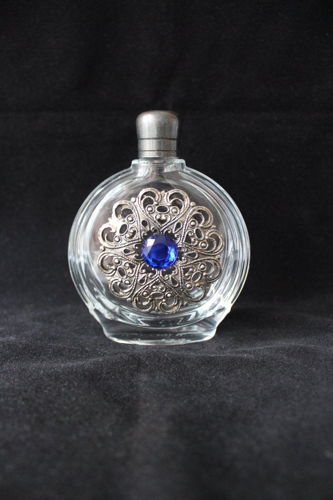 Vintage parfumflesje met decoratie uit Frankrijk, Antiek en Kunst, Ophalen of Verzenden