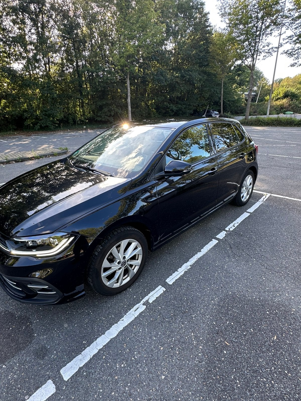 Volkswagen Polo 1.0 TSI 95pk Dsg-7 2022 Zwart, Dealer onderhouden, Stof, 95 pk, 1104 kg
