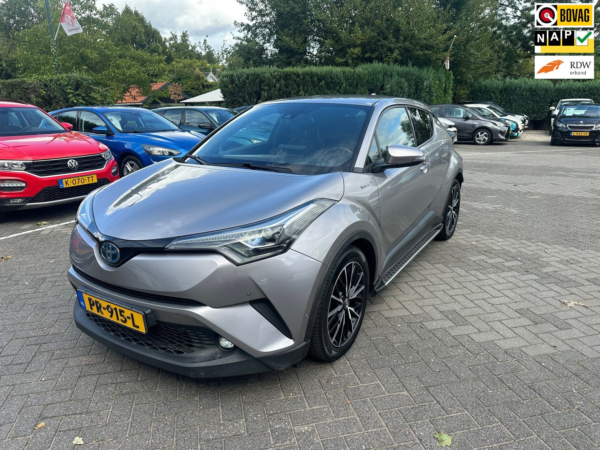 Toyota C-HR 1.8 Hybrid Premium , navigatie , camera , pdc ,, Auto's, Dealer onderhouden, Euro 6, 4 cilinders, Leder en Stof
