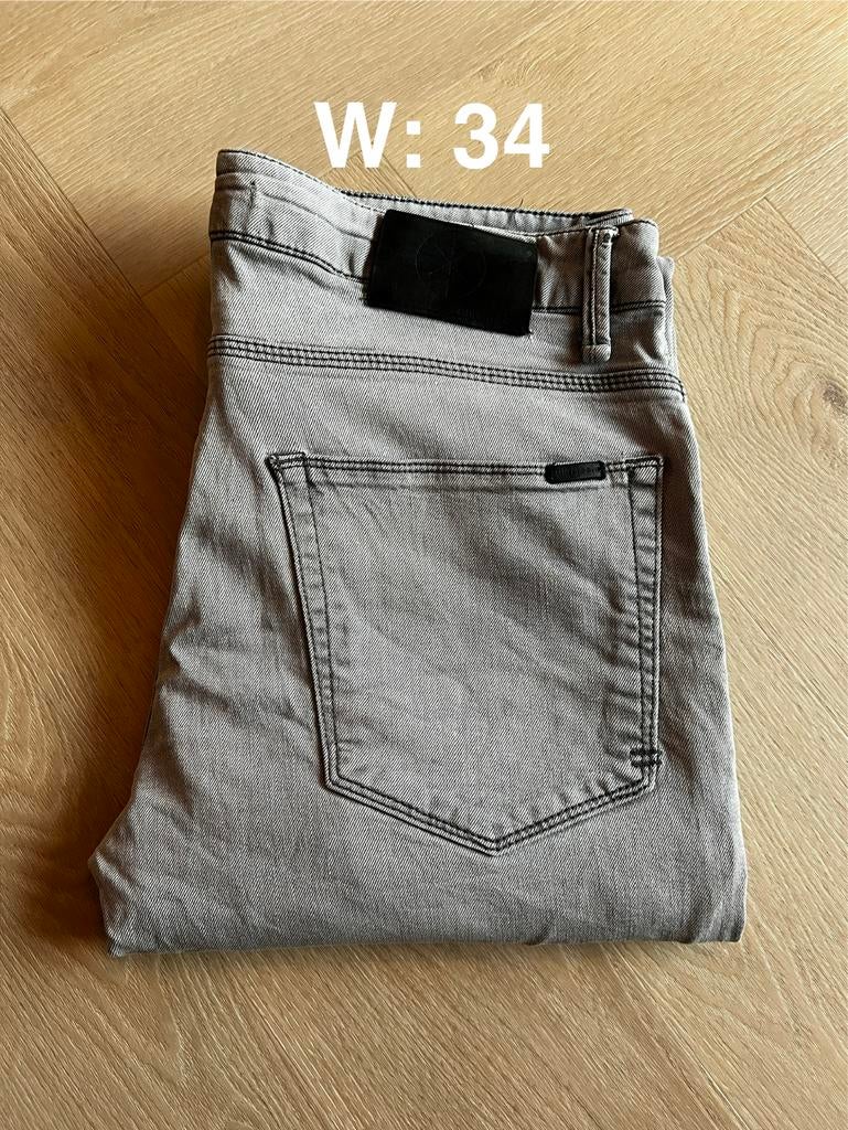 W34 - heren jeans The sting, Ophalen of Verzenden, Gedragen, Grijs, W33 - W34 (confectie 48/50)