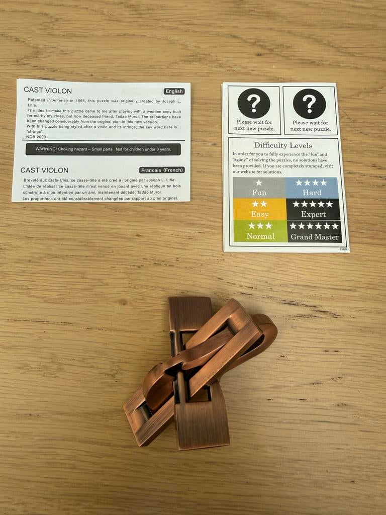 Huzzle Cast Violon Puzzel - als nieuw in doos, Hobby en Vrije tijd, Denksport en Puzzels, Ophalen of Verzenden, Zo goed als nieuw