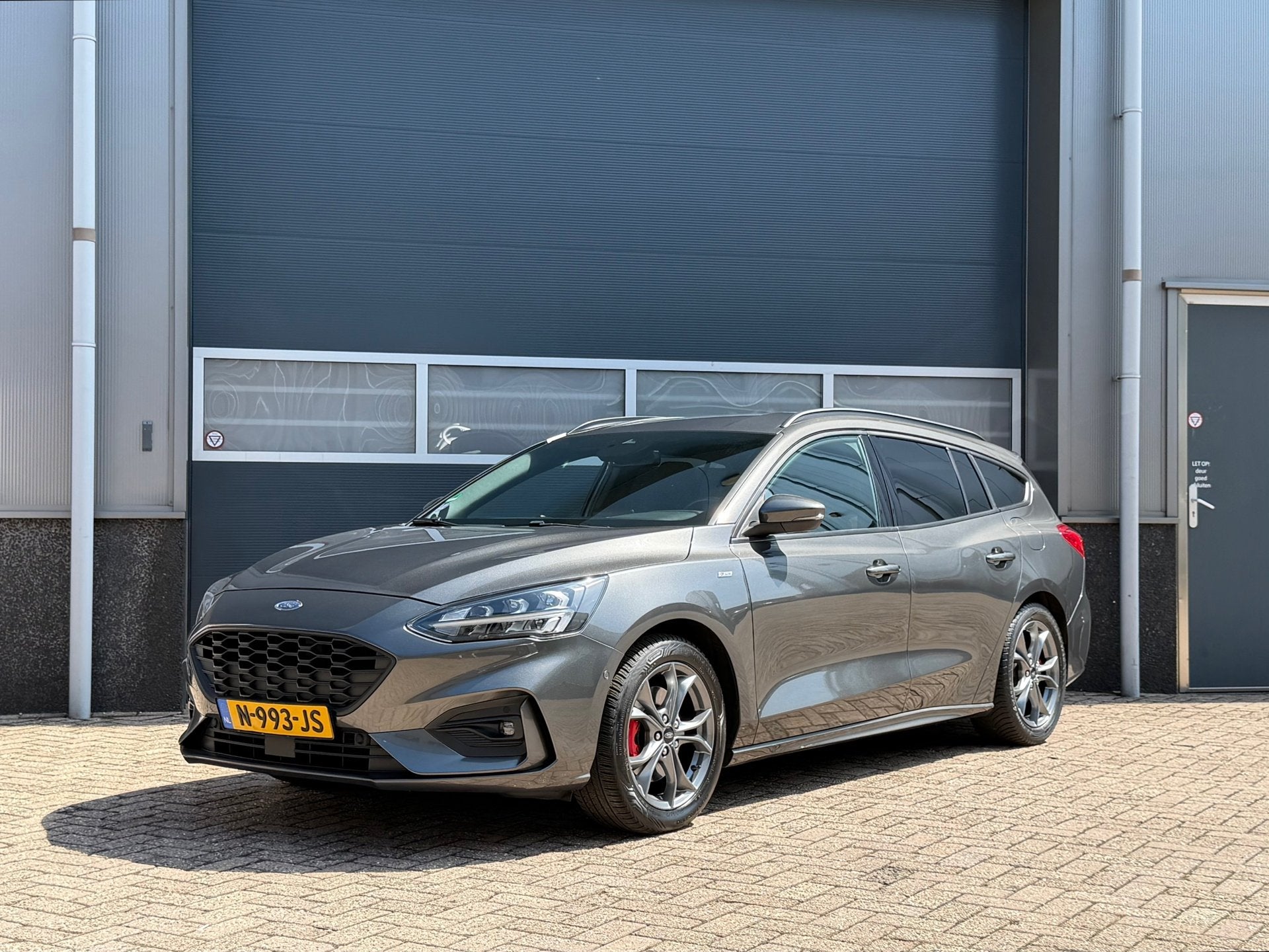 Ford Focus Wagon 1.0 Vignale ST-Line bj.2019 Camera|Navi|Pdc, Gebruikt, Euro 6, 1283 kg, Grijs
