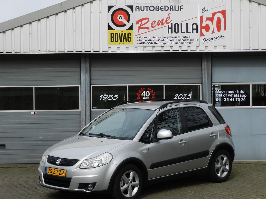 Suzuki SX4 1.6 Shogun Airco 16"LMVCV afst Isofix Metallic la, Gebruikt, Zwart, 4 cilinders, 49 €/maand